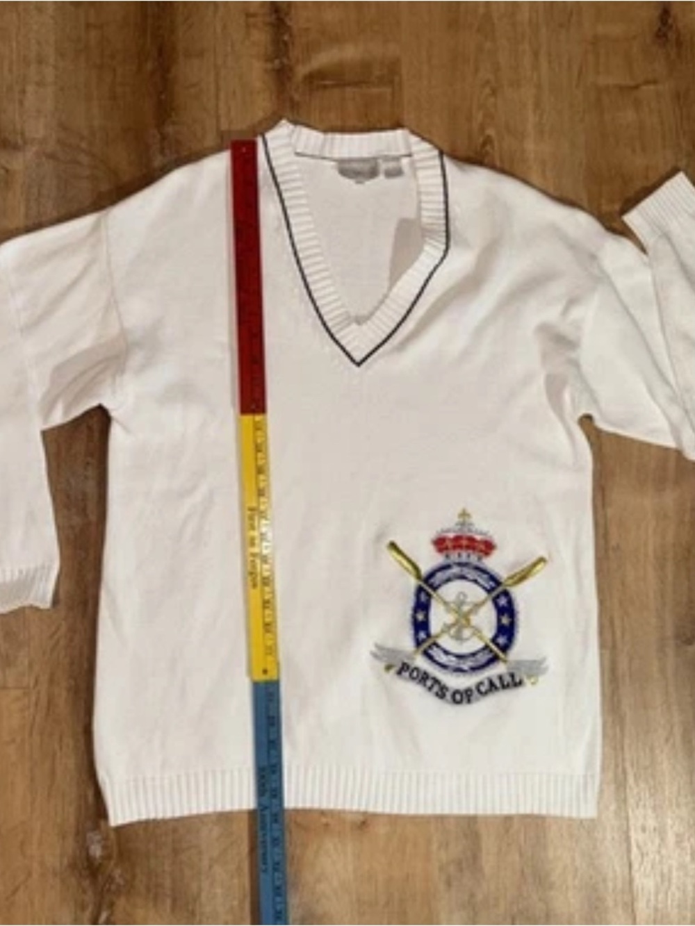White V-Neck Men’s Sweater with Embroidered Crest